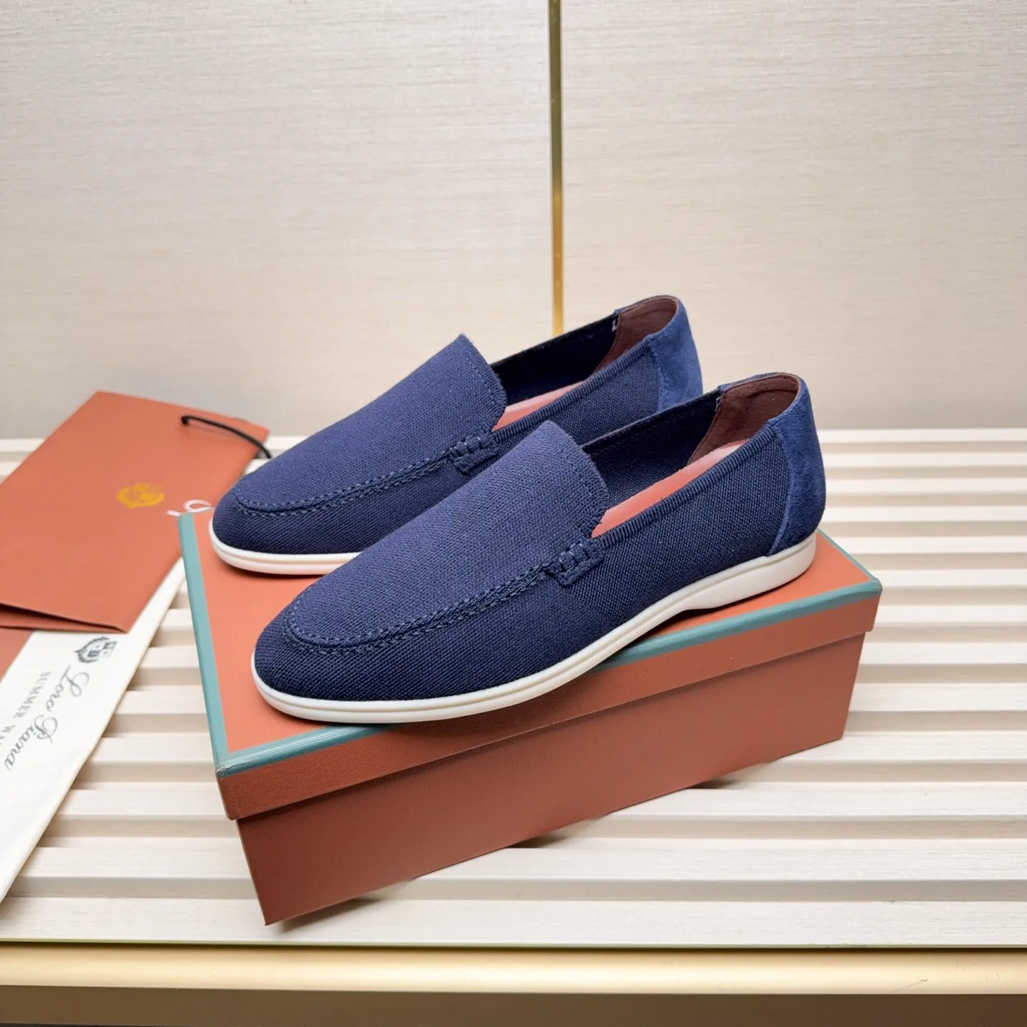 Men's Men's Shoes 💰400 Loro PIana moccasins are made of wish wool fabric. The upper is made of knitted fabric, made on a loom, and then attached to a rubber sole. The Rain System's water-repellent treatment enhances the shoe's functional design, while the suede details give the shoe a sense of elegance and sophistication. Made from Wish, fine wool from Australian and New Zealand Merino sheep